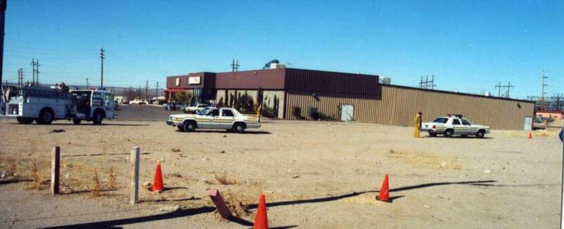 Exterior of Las Cruces Bowl on February 10, 1990, with emergency vehicles outside.